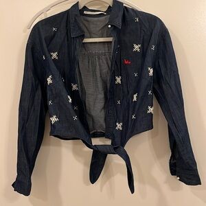 Cropped denim shirt with beaded pearls